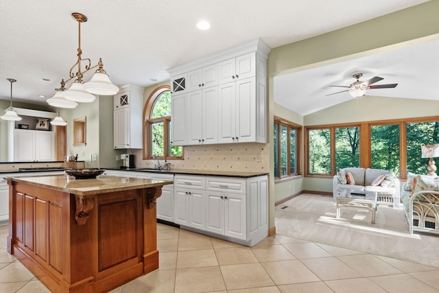 11600 43rd Ave N, Plymouth, MN 55442 - kitchen featuring white cabinets, ceiling fan, light tile patterned floors, recessed lighting, and lofted ceiling