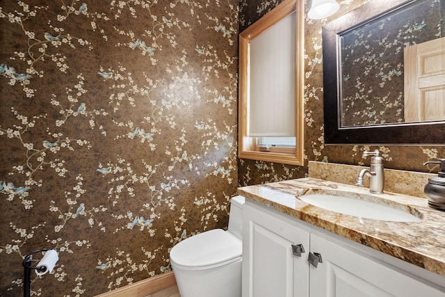 11600 43rd Ave N, Plymouth, MN 55442 - half bath with wallpapered walls, vanity, toilet, and baseboards