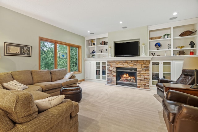 11600 43rd Ave N, Plymouth, MN 55442 - carpeted living area featuring a stone fireplace, recessed lighting, and baseboards