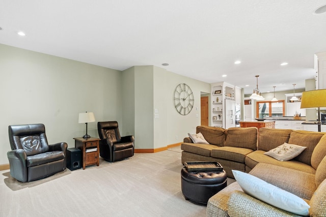 11600 43rd Ave N, Plymouth, MN 55442 - living area featuring light colored carpet, recessed lighting, and baseboards