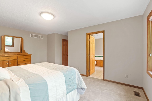 11600 43rd Ave N, Plymouth, MN 55442 - bedroom featuring light colored carpet, baseboards, and connected bathroom
