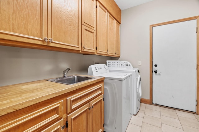 11600 43rd Ave N, Plymouth, MN 55442 - laundry area with cabinet space, washer and clothes dryer, and light tile patterned floors