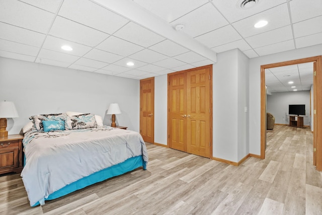 11600 43rd Ave N, Plymouth, MN 55442 - bedroom featuring a drop ceiling, light wood finished floors, baseboards, and recessed lighting