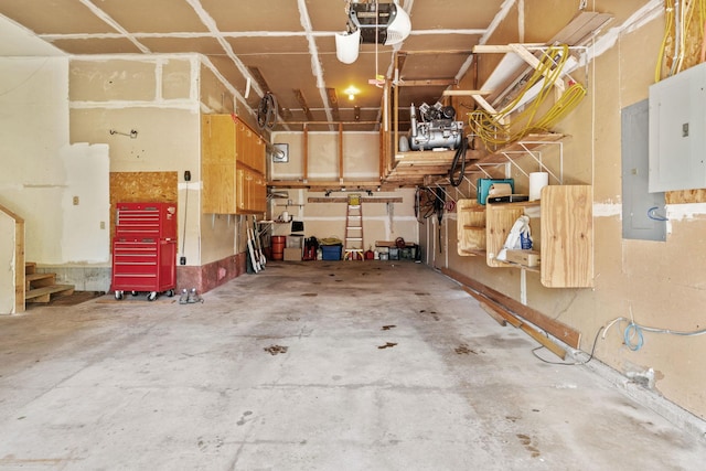 11600 43rd Ave N, Plymouth, MN 55442 - garage featuring electric panel and a garage door opener