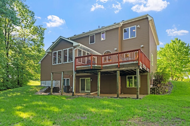 11600 43rd Ave N, Plymouth, MN 55442 - rear view of property featuring a deck, a lawn, and central AC