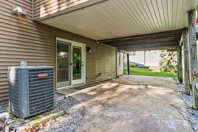 11600 43rd Ave N, Plymouth, MN 55442 - view of patio with central air condition unit and an attached carport