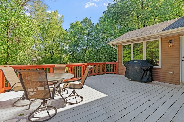 11600 43rd Ave N, Plymouth, MN 55442 - deck with outdoor dining space and a grill