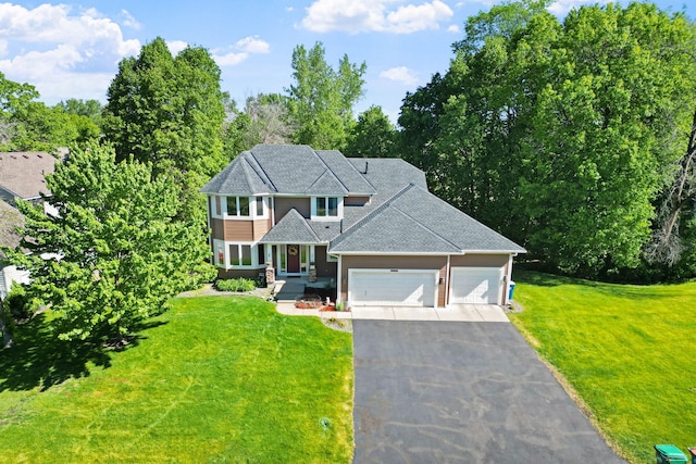 11600 43rd Ave N, Plymouth, MN 55442 - traditional-style house with asphalt driveway, a garage, a front yard, and a shingled roof