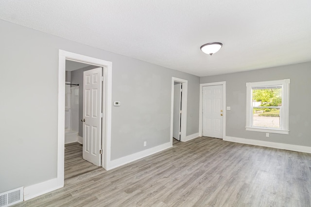 476 Brainerd Ave, Saint Paul, MN 55130 - empty room with light wood-style flooring and baseboards