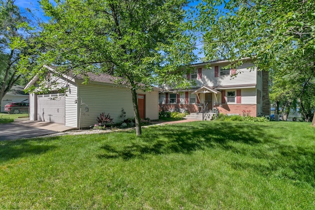 12177 Fremont Ln, Zimmerman, MN 55398 - view of front facade featuring a front yard, asphalt driveway, a garage, and brick siding