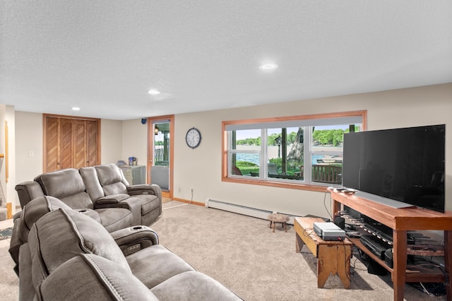 12177 Fremont Ln, Zimmerman, MN 55398 - carpeted living area featuring recessed lighting, a baseboard radiator, healthy amount of natural light, and a textured ceiling