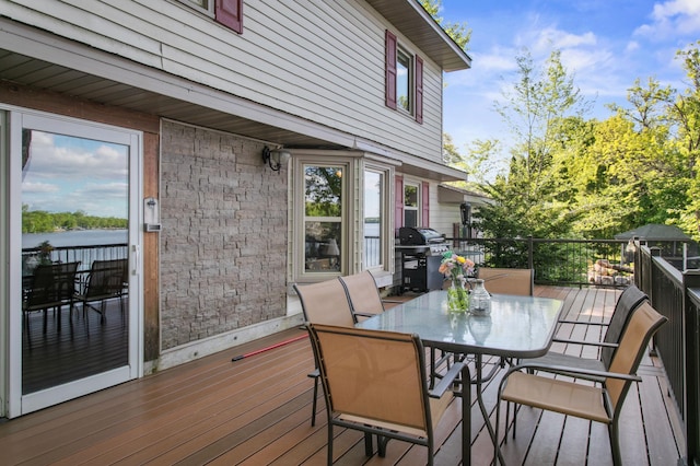 12177 Fremont Ln, Zimmerman, MN 55398 - wooden terrace featuring area for grilling and outdoor dining space