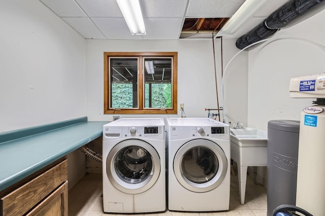 11476 65th Pl N, Maple Grove, MN 55369 - laundry area featuring washing machine and clothes dryer and light tile patterned floors