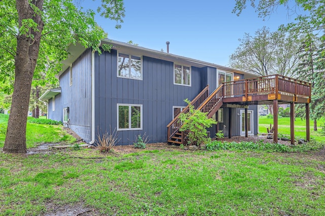 11476 65th Pl N, Maple Grove, MN 55369 - back of house featuring stairs, a wooden deck, and a lawn