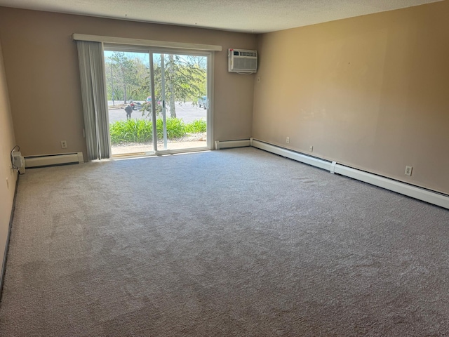 unfurnished room with a wall mounted AC, a baseboard heating unit, carpet floors, a textured ceiling, and baseboards