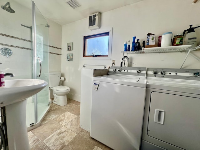 308 Cedar Ave S, Odessa, MN 56276 - laundry area featuring washing machine and clothes dryer