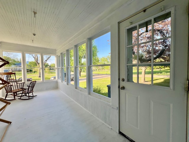 308 Cedar Ave S, Odessa, MN 56276 - unfurnished sunroom with wood ceiling