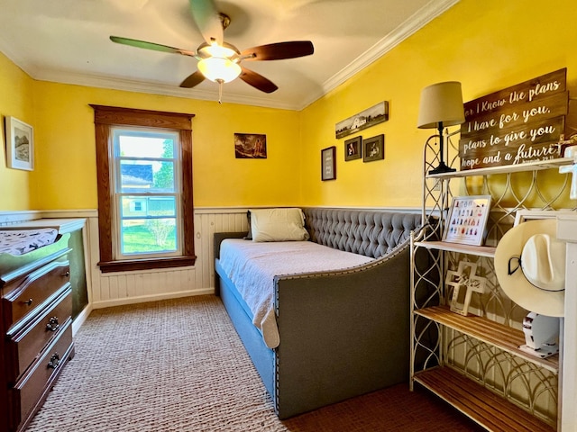 308 Cedar Ave S, Odessa, MN 56276 - carpeted bedroom with ornamental molding, wainscoting, and ceiling fan
