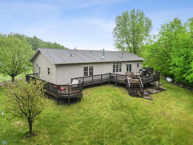 15350 Blackhawk Rd, Audubon, MN 56511 - rear view of house with a wooden deck, a lawn, and a shingled roof