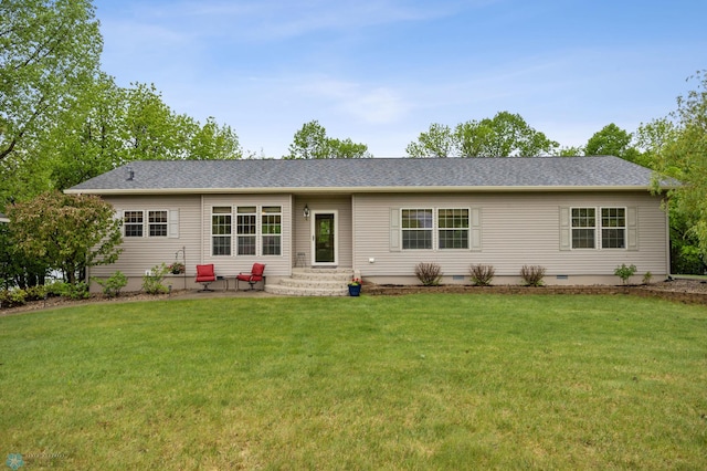 15350 Blackhawk Rd, Audubon, MN 56511 - back of property featuring entry steps, a lawn, and a patio area