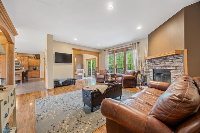15350 Blackhawk Rd, Audubon, MN 56511 - living room with a fireplace, recessed lighting, and light wood finished floors