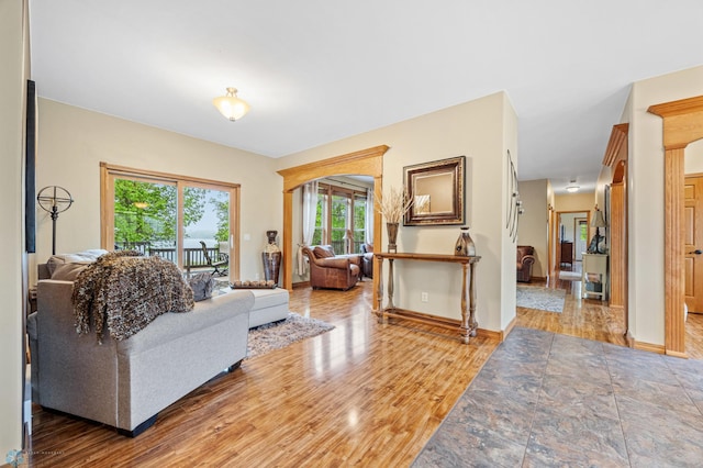 15350 Blackhawk Rd, Audubon, MN 56511 - living area featuring healthy amount of natural light, wood finished floors, and baseboards