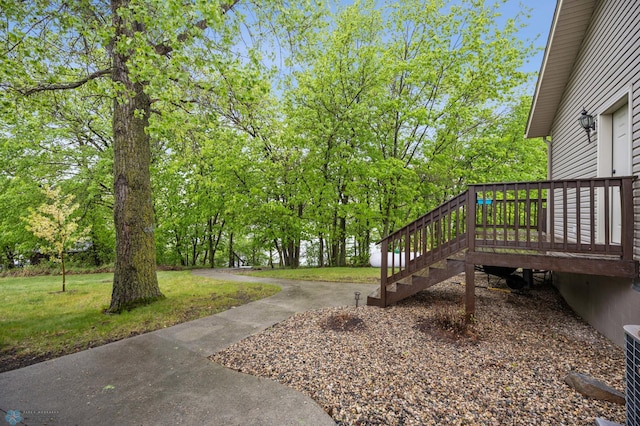15350 Blackhawk Rd, Audubon, MN 56511 - view of grassy yard with a deck and stairs