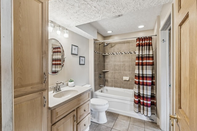 809 Orchard St, Belle Plaine, MN 56011 - bathroom featuring tile patterned flooring, vanity, a textured ceiling, shower / bath combination with curtain, and toilet