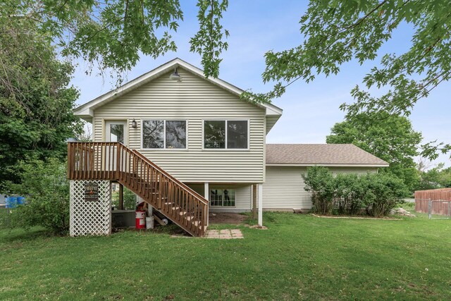 809 Orchard St, Belle Plaine, MN 56011 - back of house with stairs and roof with shingles