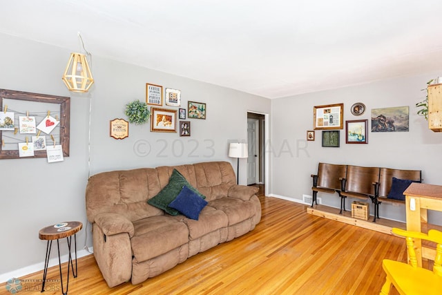 1538 10th St N, Fargo, ND 58102 - living room featuring wood finished floors and baseboards