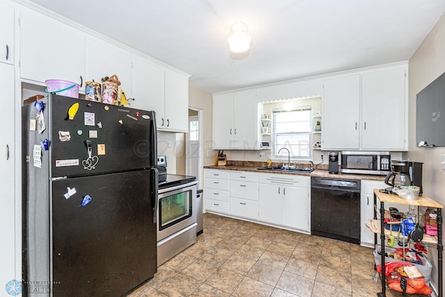 1538 10th St N, Fargo, ND 58102 - kitchen featuring black appliances, a sink, open shelves, and white cabinets