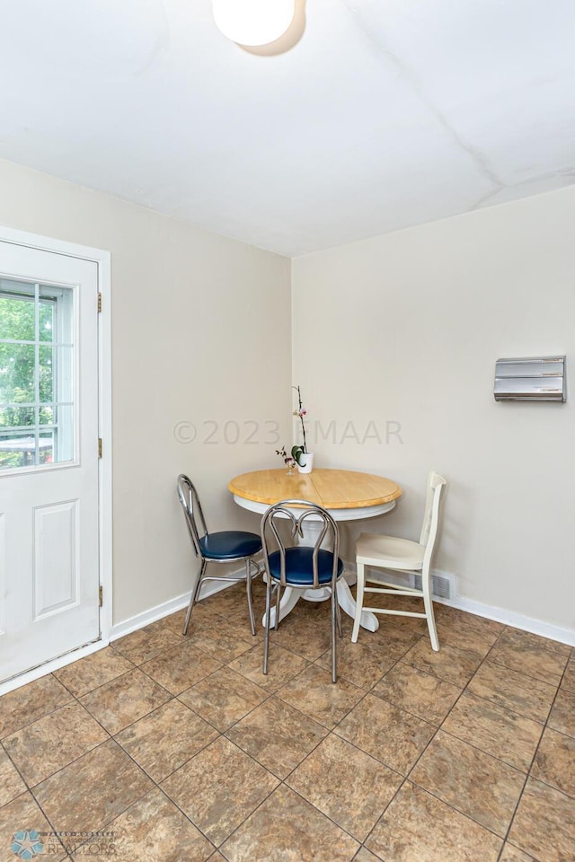 1538 10th St N, Fargo, ND 58102 - dining space with baseboards
