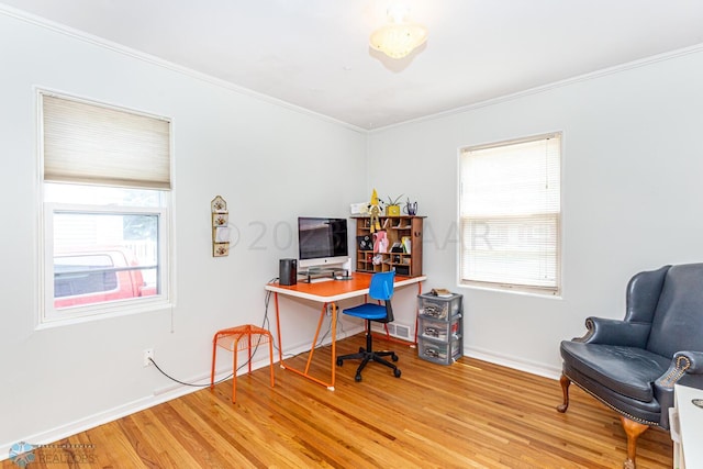 1538 10th St N, Fargo, ND 58102 - office featuring light wood-type flooring, ornamental molding, plenty of natural light, and baseboards