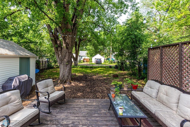 1538 10th St N, Fargo, ND 58102 - wooden terrace with an outdoor living space, fence, and area for grilling