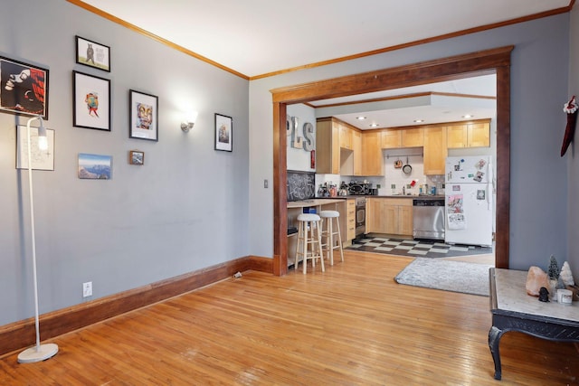 3205 Grand Ave S, Minneapolis, MN 55408 - interior space featuring light wood-style floors, baseboards, and crown molding