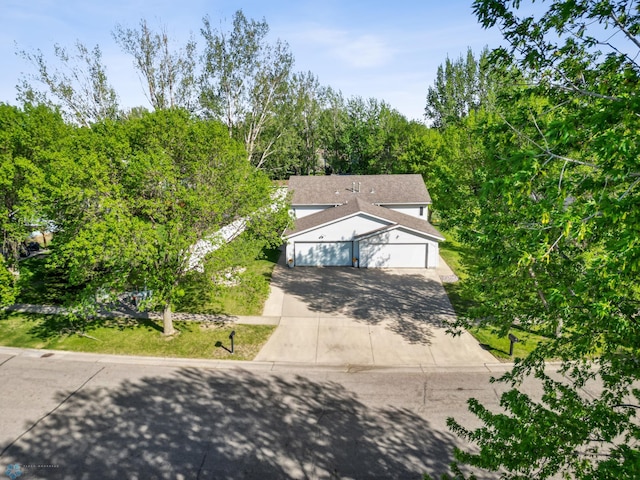 view of front of house featuring driveway and an attached garage