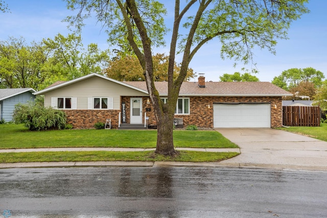 3105 Edgewood Dr N, Fargo, ND 58102 - ranch-style home with an attached garage, brick siding, a chimney, and concrete driveway