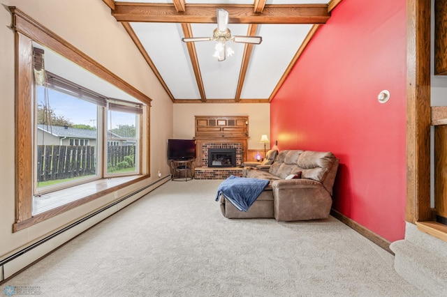 3105 Edgewood Dr N, Fargo, ND 58102 - carpeted living room featuring a baseboard radiator, lofted ceiling, a fireplace, and ceiling fan
