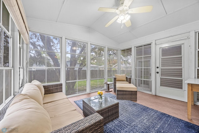 3105 Edgewood Dr N, Fargo, ND 58102 - sunroom / solarium featuring a deck, an outdoor living space, lofted ceiling, ceiling fan, and healthy amount of natural light