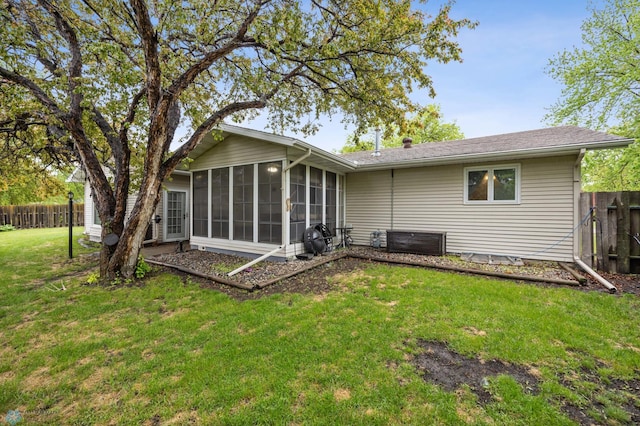 3105 Edgewood Dr N, Fargo, ND 58102 - back of house with a sunroom