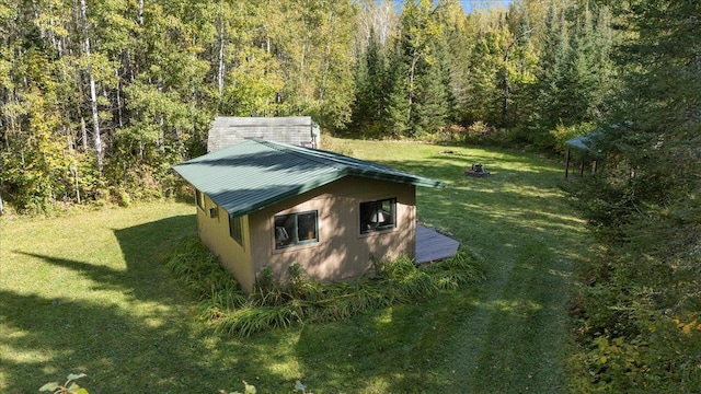 10397 Johnson Rd, Orr, MN 55771 - view of outbuilding featuring a wooded view