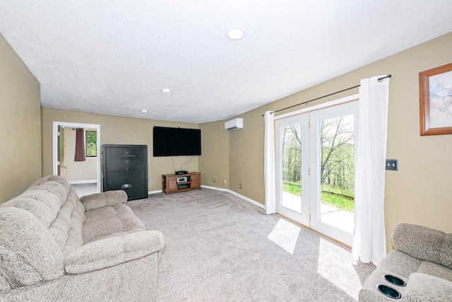 3818 Erickson Rd, Barnum, MN 55707 - living room with a wall unit AC, baseboards, light carpet, and recessed lighting
