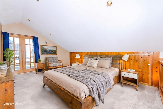 3818 Erickson Rd, Barnum, MN 55707 - bedroom featuring light carpet, vaulted ceiling, wooden walls, and access to outside