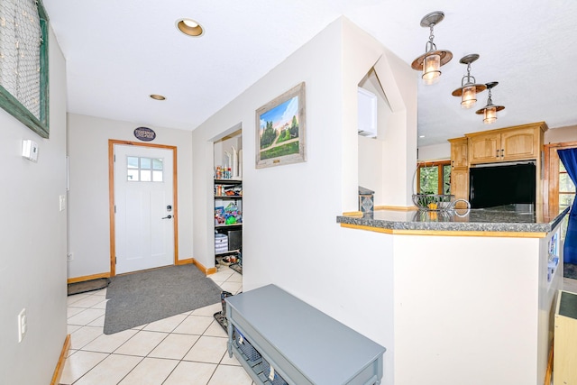 3818 Erickson Rd, Barnum, MN 55707 - foyer featuring light tile patterned flooring, plenty of natural light, baseboards, and recessed lighting