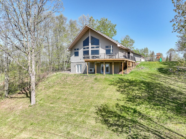 3818 Erickson Rd, Barnum, MN 55707 - back of house featuring a deck and a lawn