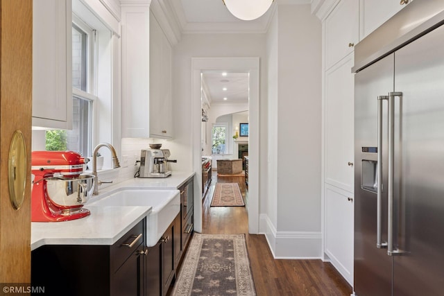 46 Crocus Pl, Saint Paul, MN 55102 - kitchen with stainless steel built in refrigerator, ornamental molding, a sink, dark wood finished floors, and light countertops