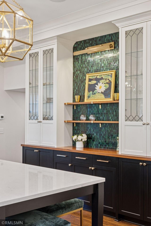 46 Crocus Pl, Saint Paul, MN 55102 - indoor dry bar featuring decorative light fixtures