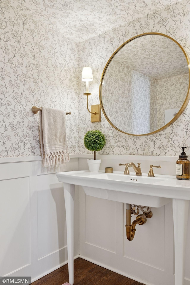 46 Crocus Pl, Saint Paul, MN 55102 - bathroom featuring wallpapered walls and wood finished floors