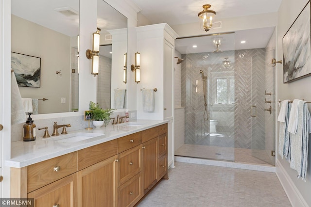 46 Crocus Pl, Saint Paul, MN 55102 - bathroom with a stall shower, double vanity, and recessed lighting
