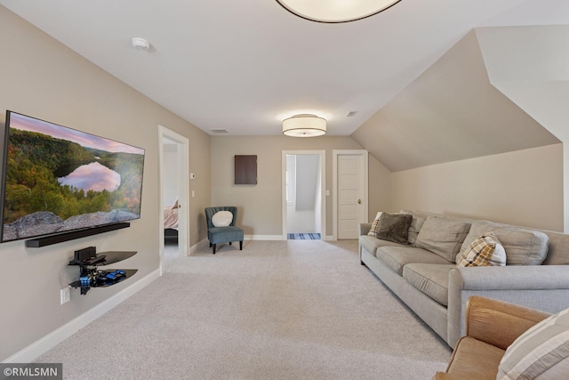 46 Crocus Pl, Saint Paul, MN 55102 - living area with light carpet, baseboards, and lofted ceiling